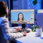 creative creator doing portrait retouch using color grade late night professional editing office